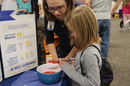 Nurse working with kids.